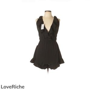 PRICE DROP!!! Love Riche Black Ruffle Romper (NWT)